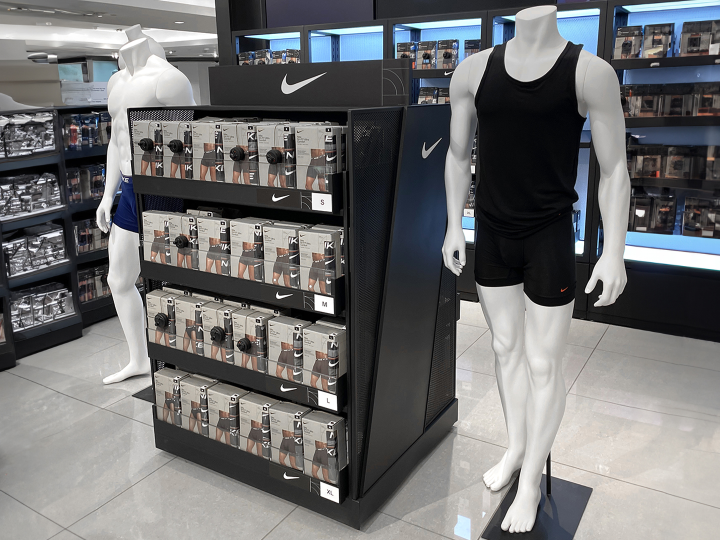 Custom underwear display with neatly arranged products on tiered shelves